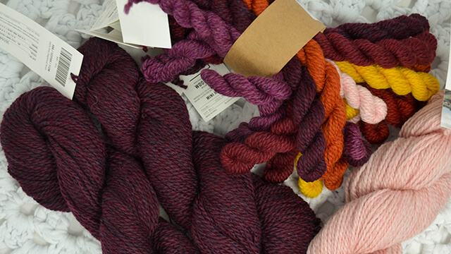 A photo of Blue Sky Fibers Woolstok Bundle in Warm colorway.